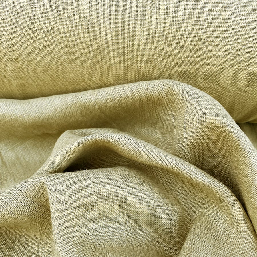 100% Linen fabric with a super soft drape in a soft khaki green. Suitable for curtains and blinds where a good drape is uppermost.