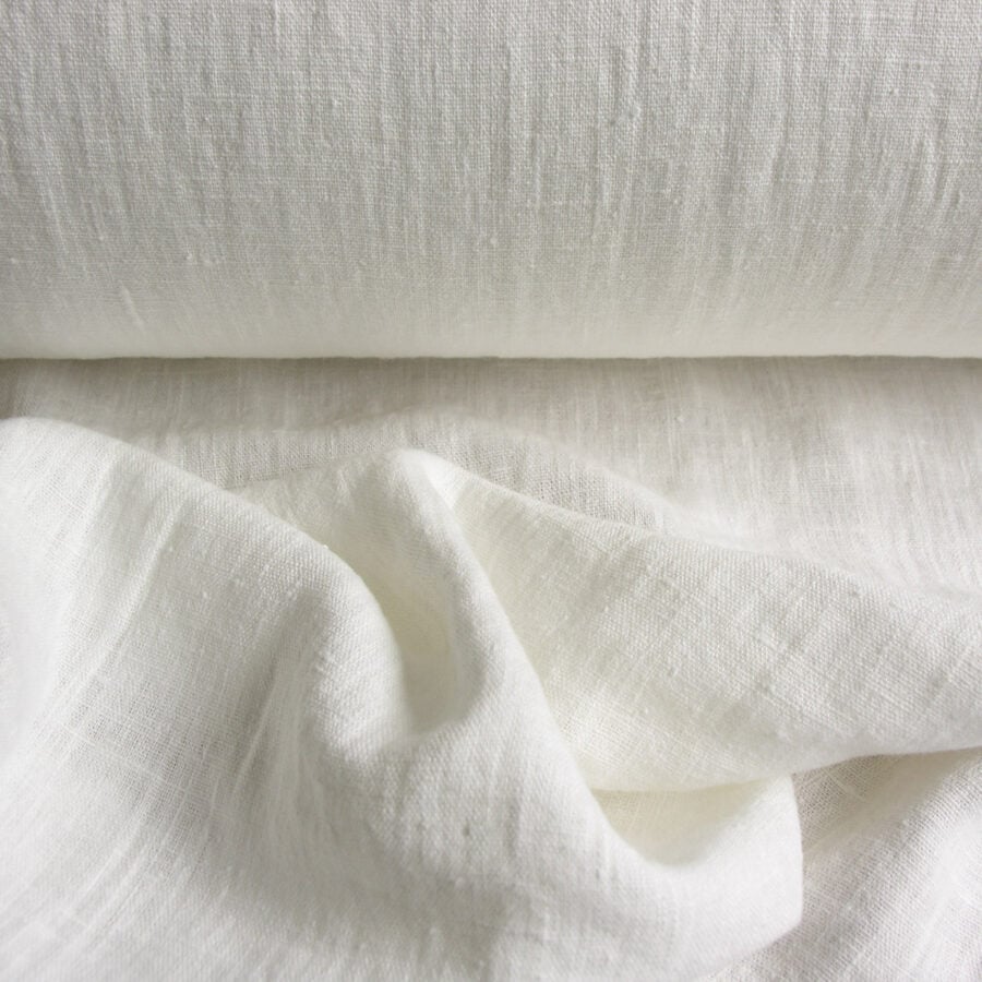 100% Linen fabric with a super soft drape, in a white just off bright white.