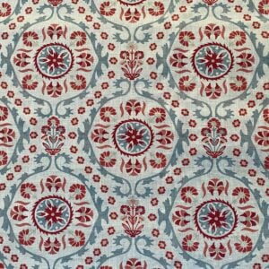 Tinsmiths Extra Wide Suzani print cloth on a roll in Strawberry & Duckegg