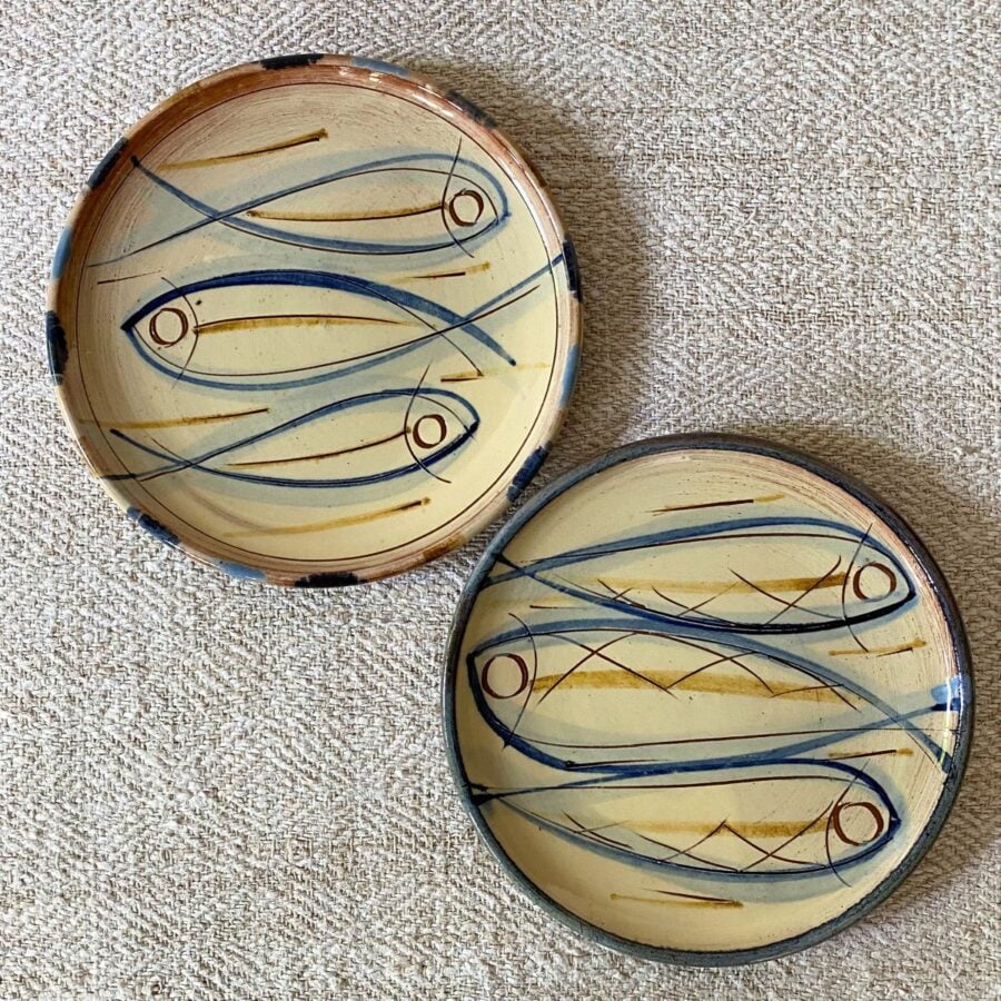 Pair of Jennifer Hall cream glazed side plates on cream backcloth