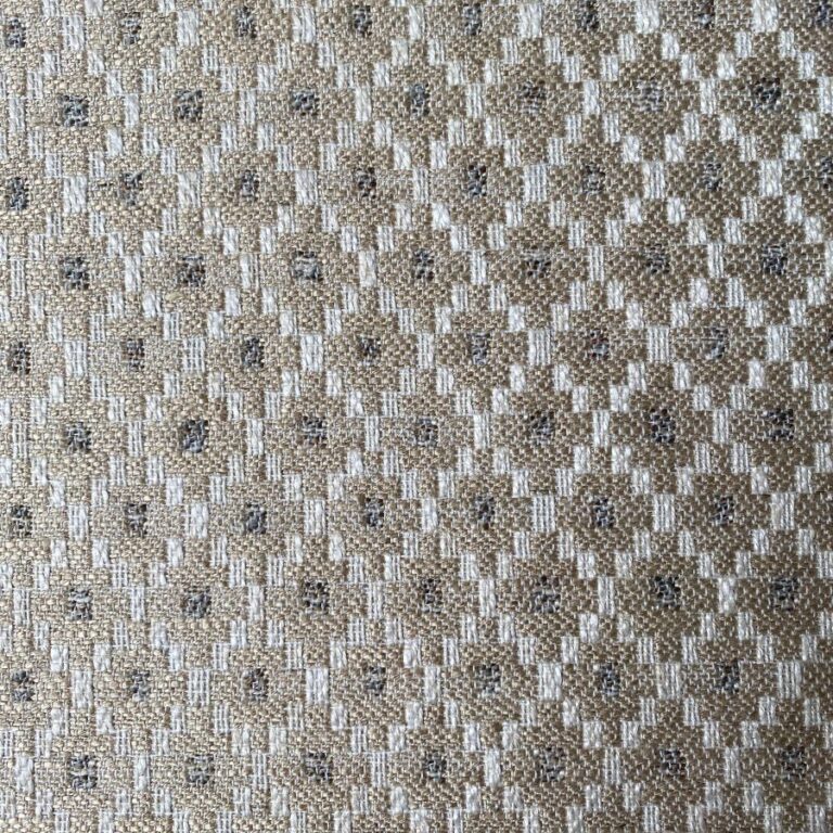 Cream, diamond patterned upholstery fabric