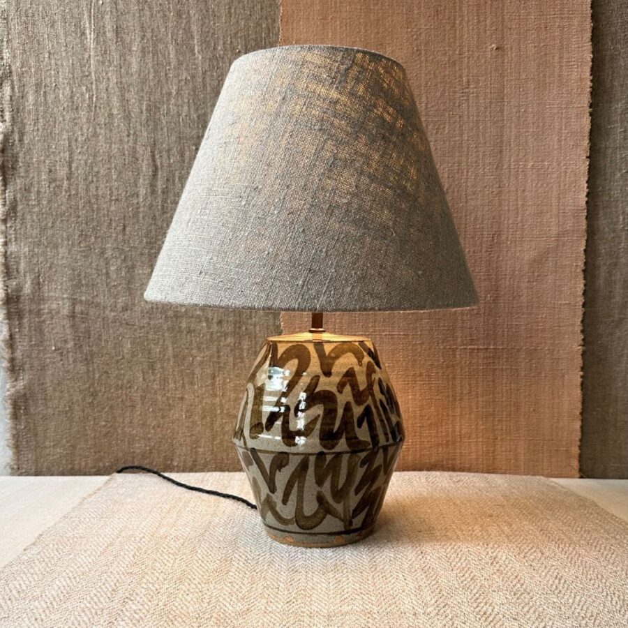 Pottery lamp with a linen shade