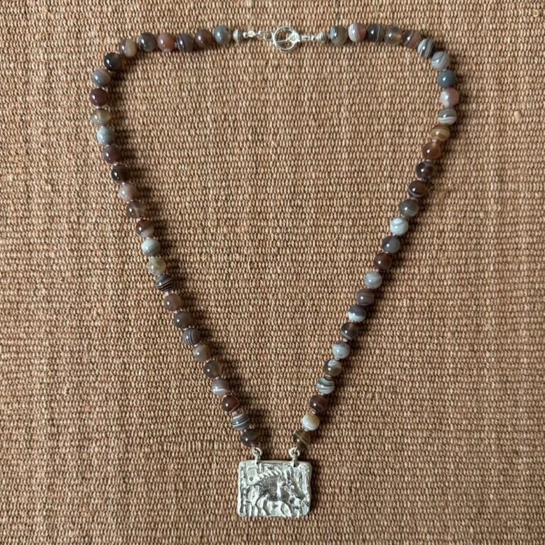 Silver boar pendant with agate necklace