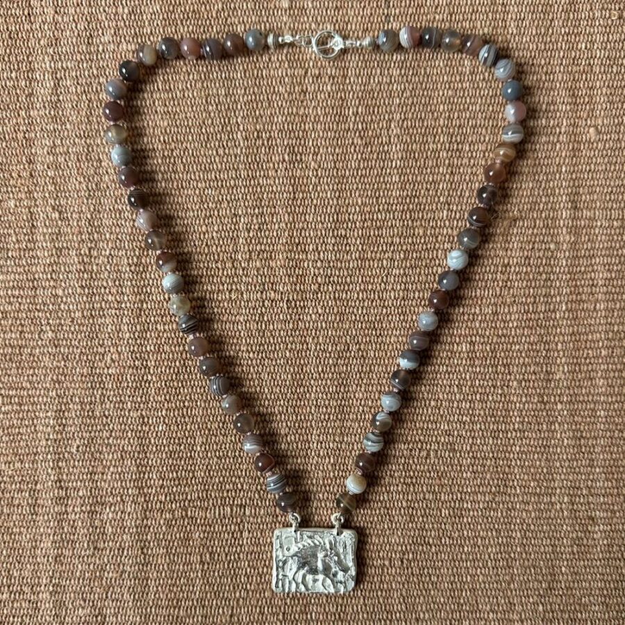 Silver boar pendant with agate necklace