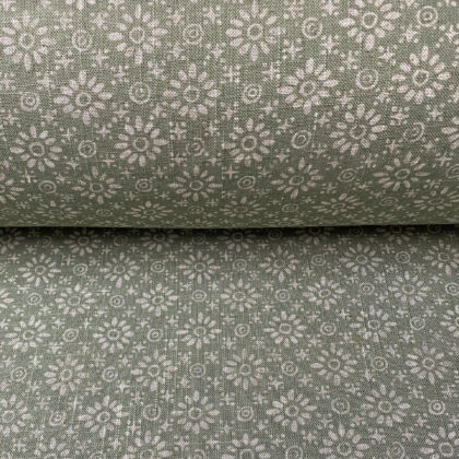 Roll of fabric with a sage green floral design