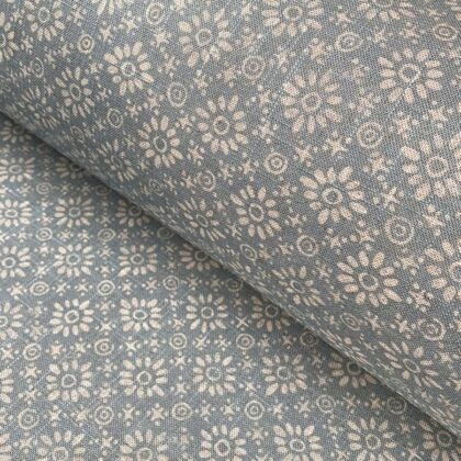 Fabric roll with sea blue, small scale daisy pattern