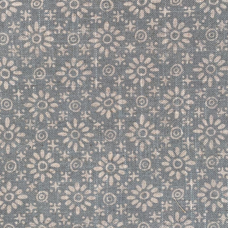 Fabric roll with sea blue, small scale daisy pattern
